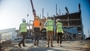 Team of specialists discuss key features of delivery management system